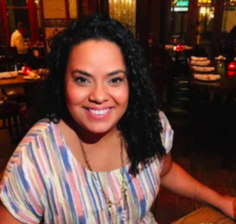 Business executives signing partnership agreement at education conference in Riyadh, Saudi Arabia