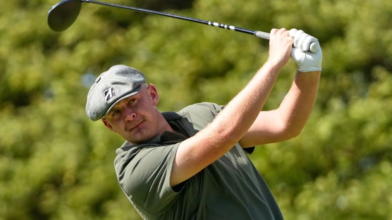 English golfer Harry Hall lines up a putt during the Sony Open in Hawaii