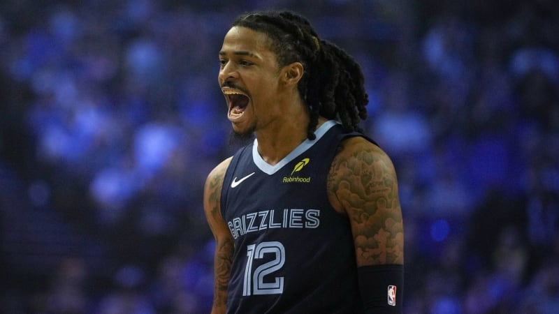 Memphis Grizzlies point guard Ja Morant dribbling basketball during game at London O2 Arena