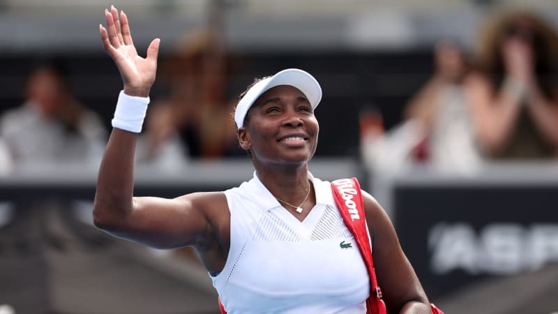 Venus Williams playing competitive tennis at age 45 during Auckland WTA tournament match showing athletic form
