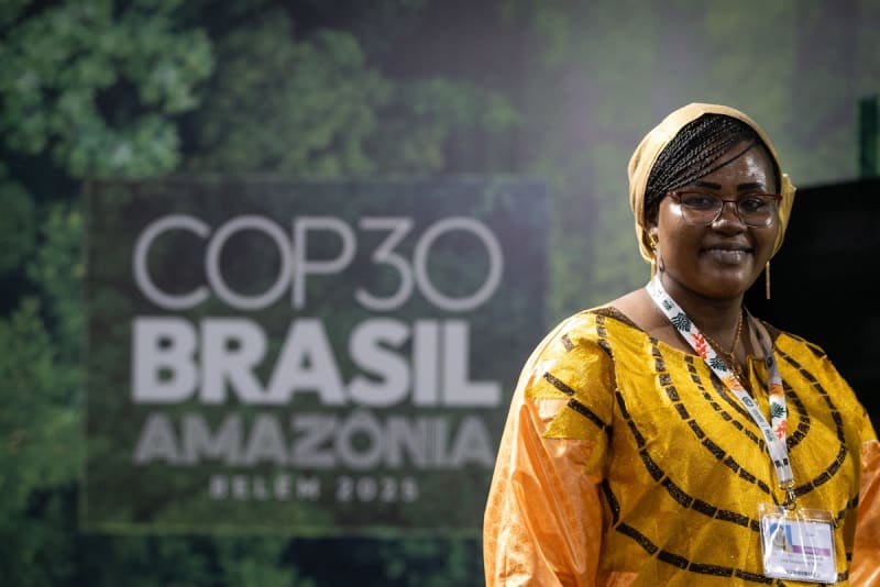 World map showing connected dots representing international environmental cooperation and global partnerships