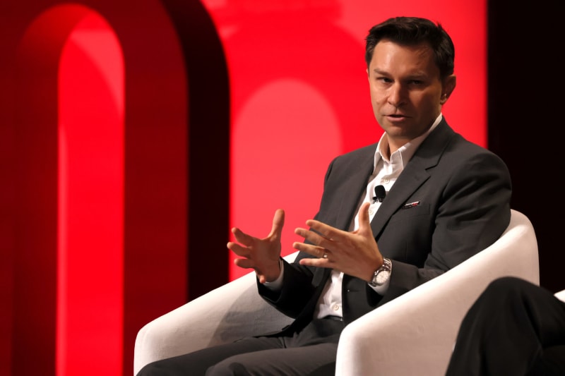 Scientists examining cellular samples in modern medical research laboratory setting