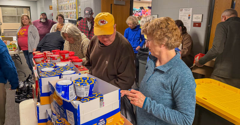 Volunteers Pack 576 Food Kits for Hungry Students