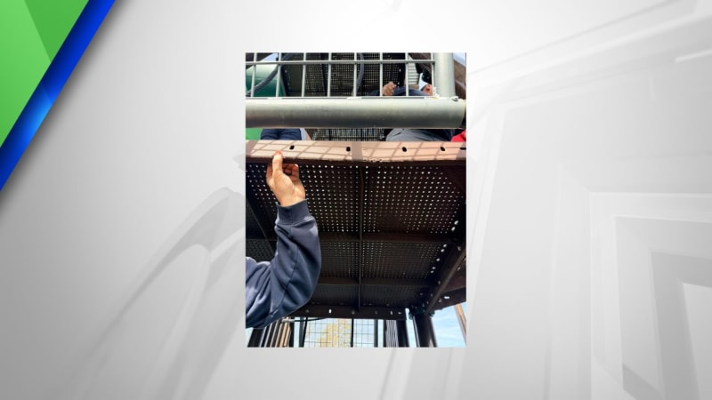 Rescue squad vehicle parked at playground where crew safely freed trapped child