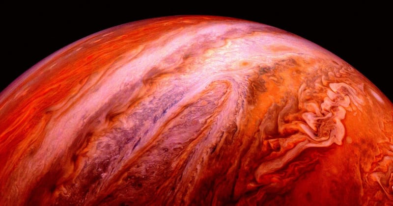 Jupiter's swirling cloud bands captured by NASA's Juno spacecraft in vivid color
