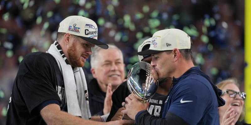 Seattle Seahawks players and coach Mike Macdonald celebrating Super Bowl LX championship victory