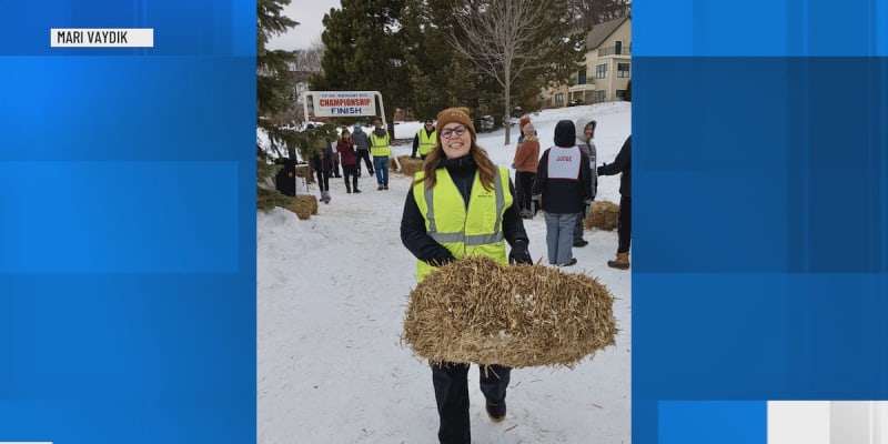 Volunteers preparing for UP200 sled dog race in snowy Upper Peninsula Michigan