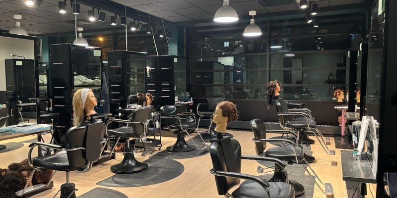 Northern Michigan University cosmetology students collecting winter coats and gear for local women's shelter