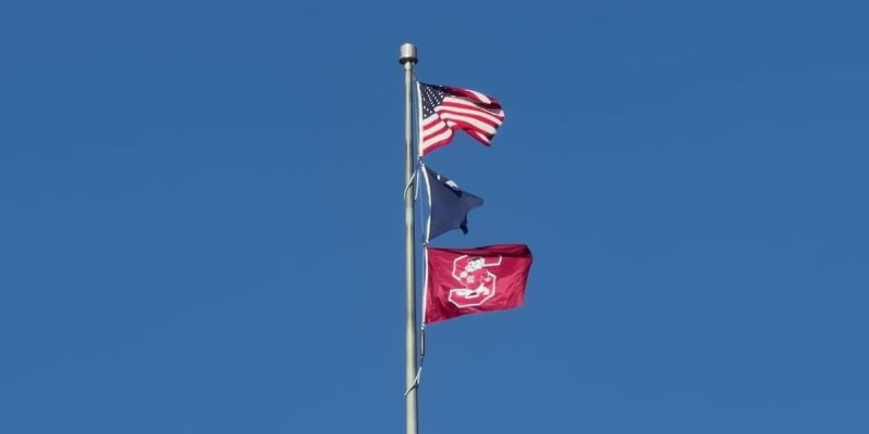South Carolina State University Bulldogs flag flying over the State House dome in Columbia