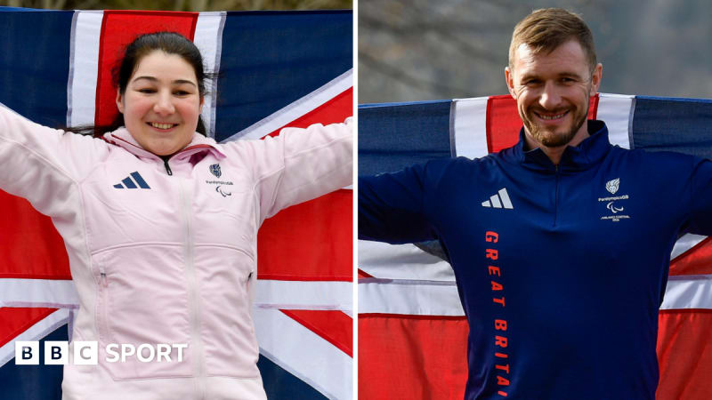 British Paralympic skiers Menna Fitzpatrick and Scott Meenagh posing together in Team GB uniforms