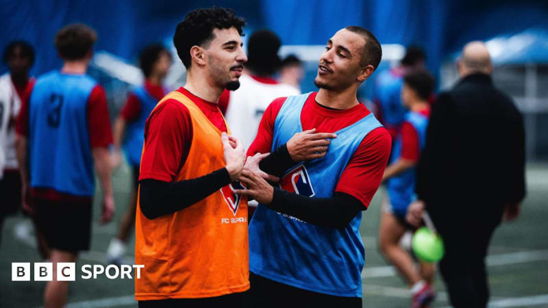 FC Supra du Quebec players in blue, white and red jerseys with Quebec flag during training session