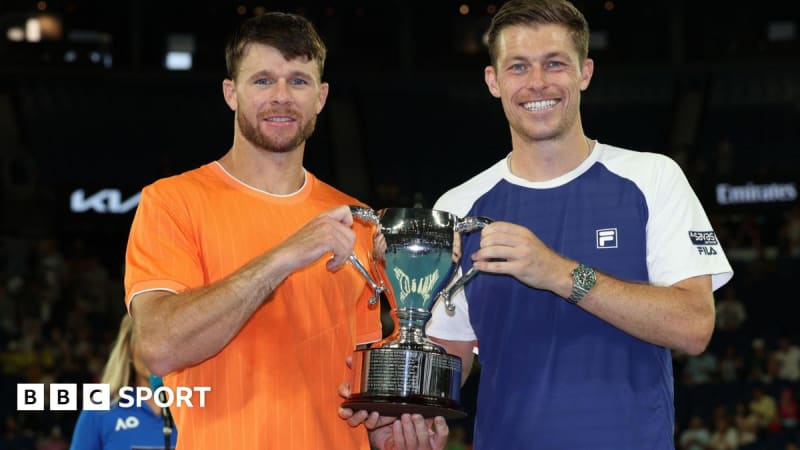 Neal Skupski and Christian Harrison celebrating their Australian Open doubles championship victory together