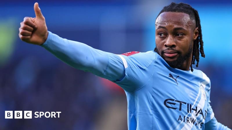 Antoine Semenyo celebrating in Manchester City's light blue jersey during his debut match