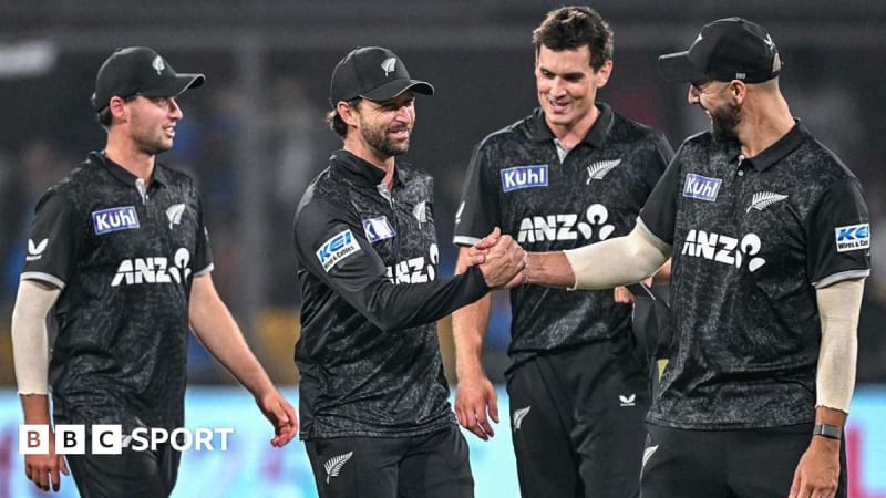 New Zealand cricket players celebrating jubilantly after bowling out India for 296 runs