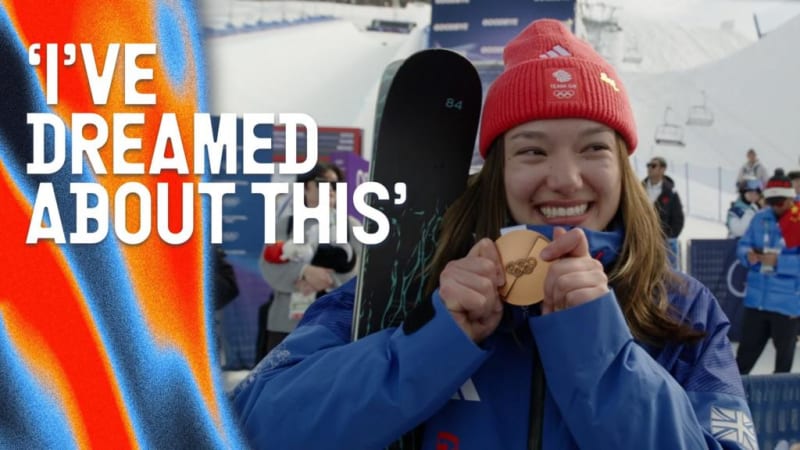 Zoe Atkin celebrates with bronze medal after freeski halfpipe competition at Winter Olympics