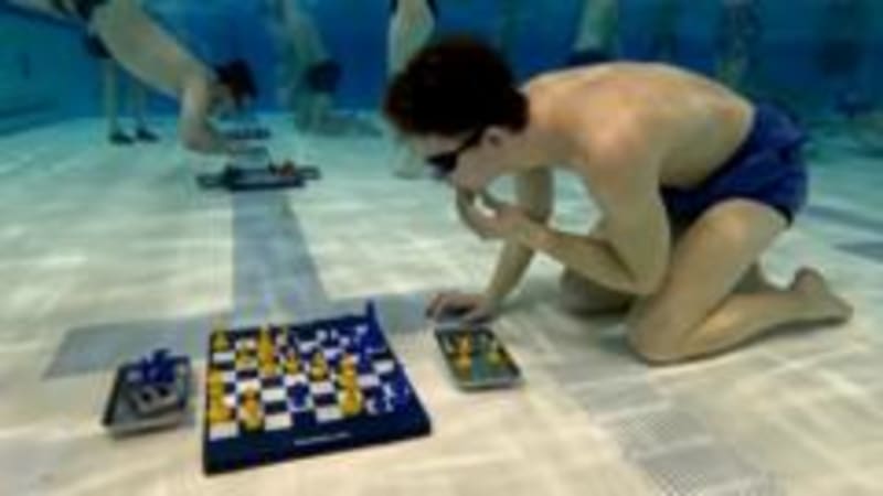 Breath-Holding Chess Champions Dive into Underwater Strategy