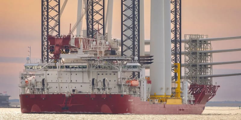 Offshore wind turbines rising from ocean waters off Virginia coastline during construction phase