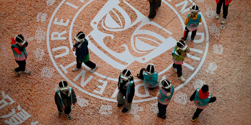 Visitors wearing lightweight VR headsets exploring an immersive virtual reality experience in Shanghai