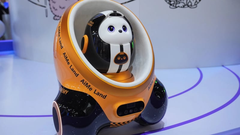 Technology executives on stage at CES 2026 announcing partnership for fusion energy and AI-driven manufacturing innovations