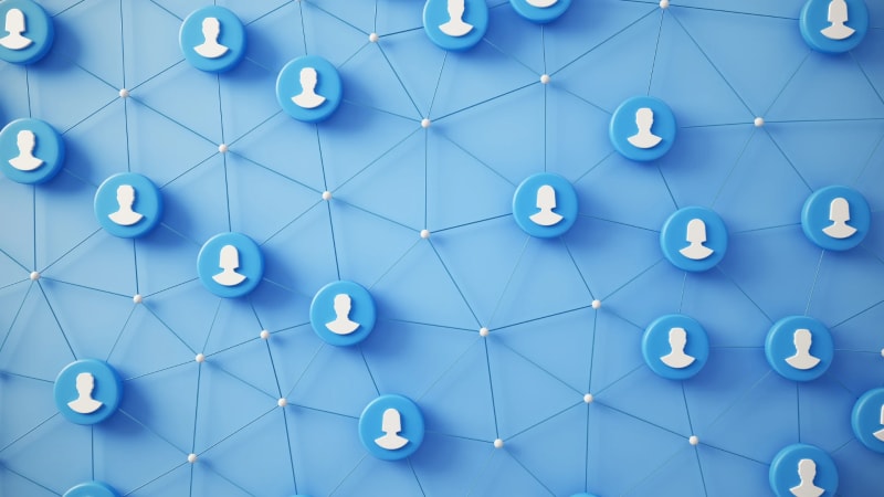 Diverse group of professionals collaborating happily on video conference screens, representing connected global teamwork and international collaboration