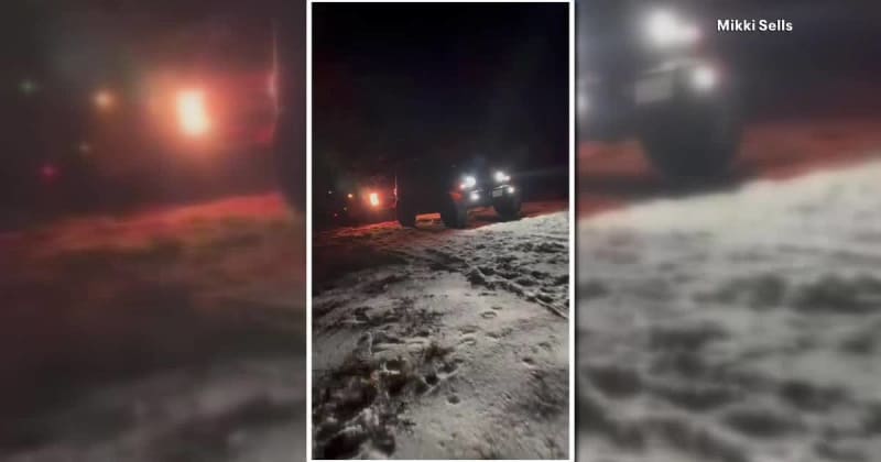 Four-wheel drive truck navigating icy road to transport nurses during Texas winter storm