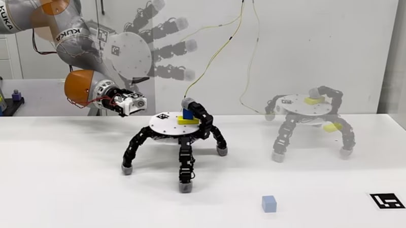 Six-fingered robotic hand detached from arm, standing upright on its fingers ready to crawl and grasp objects