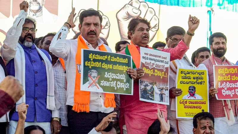 Government officials and civic authorities working on urban development and land reclamation project in Bengaluru's Kogilu Layout area
