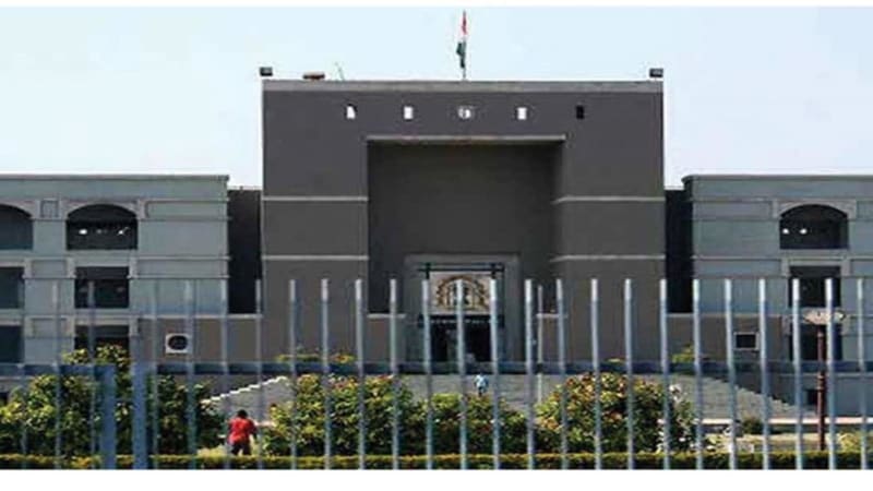 Gujarat High Court building exterior showcasing India's judicial system protecting citizen rights and proper legal procedures