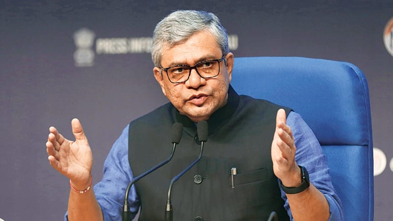 ** Modern high-speed bullet train on elevated tracks against blue sky in Gujarat India