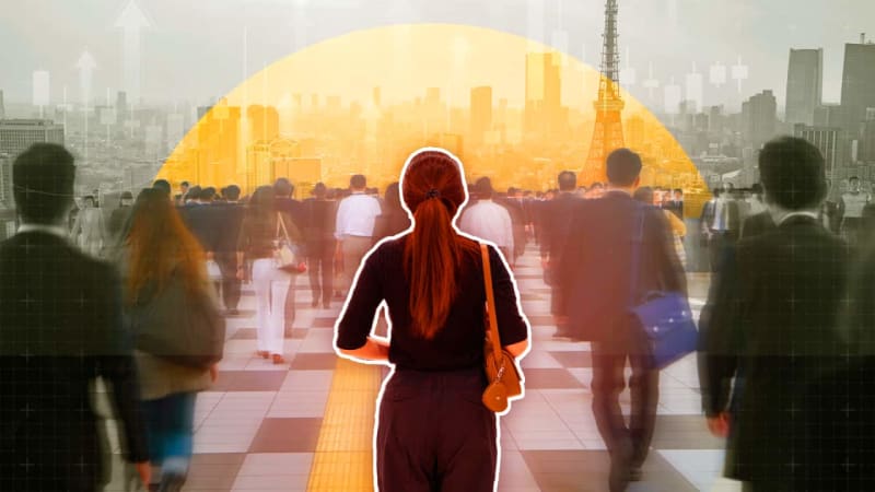 Japanese office workers leaving work at reasonable hour in Tokyo business district