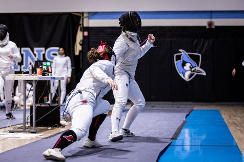 Johns Hopkins fencer Rosy Cepero celebrating historic 300th career win at national championship competition
