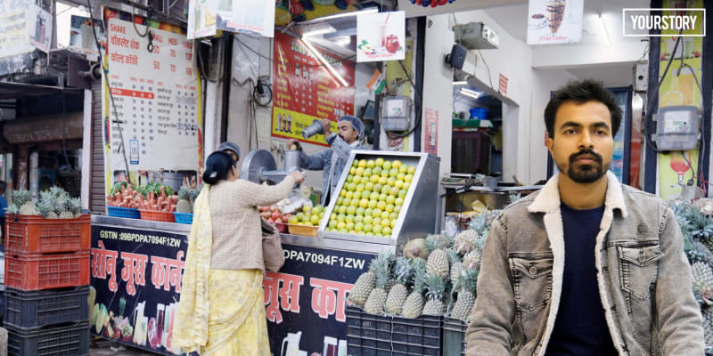Small juice shop owner Mohammad Anas preparing fresh fruit drinks at his Sultanpur stand