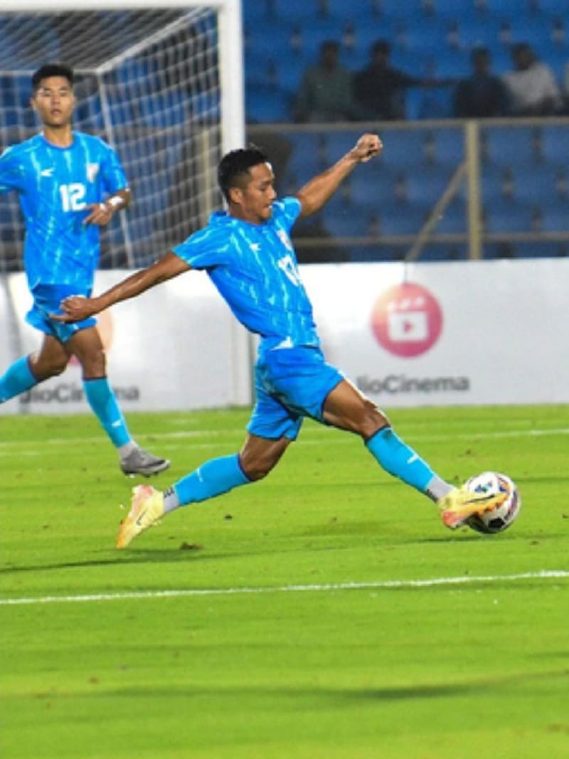 Indian football players in blue jerseys celebrating together on field, representing unity and hope for Indian football's future