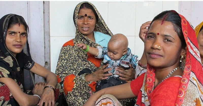 Healthcare workers in Assam using digital tablets to access unified health platform system