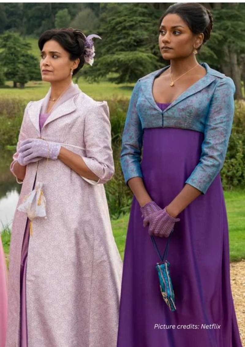 Vibrant Indian-inspired Regency costume with intricate embroidery from Bridgerton's Sharma family wardrobe