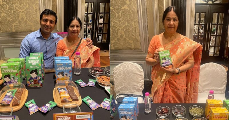 ** Indian grandmother Usha Shrotiya holding traditional laddu snack bars from her food startup