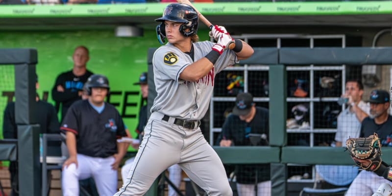 Young baseball prospects celebrating and training on field, showcasing next generation of MLB talent and determination