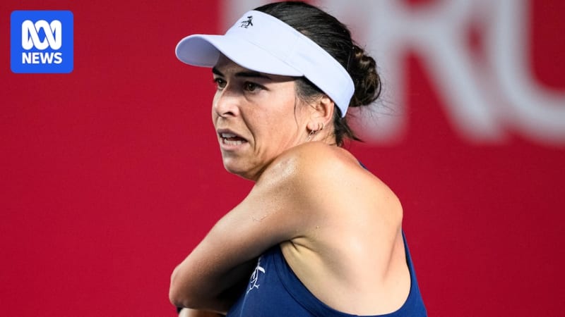 Tennis player Ajla Tomljanović competing intensely during a match at the Brisbane International tennis tournament