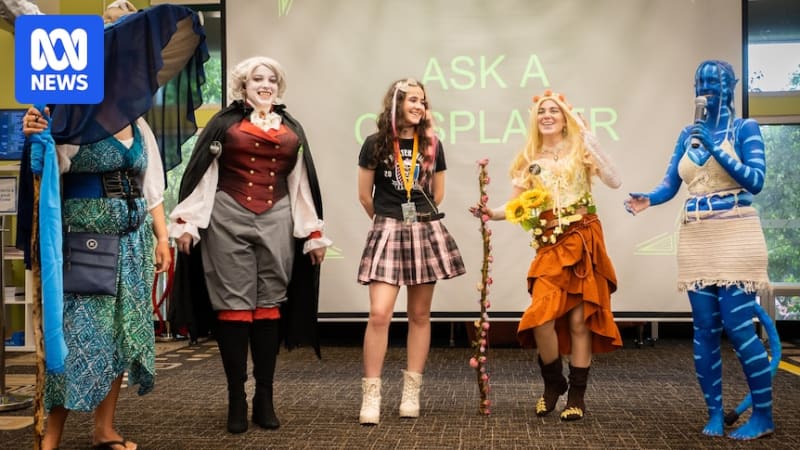 Cosplayers in colorful creative costumes gather inside Casuarina Library for Darwin's Geektacular event