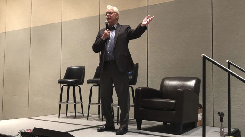Former NHL player Derek Sanderson speaking to crowd at Minnesota Wild Recovery Night event