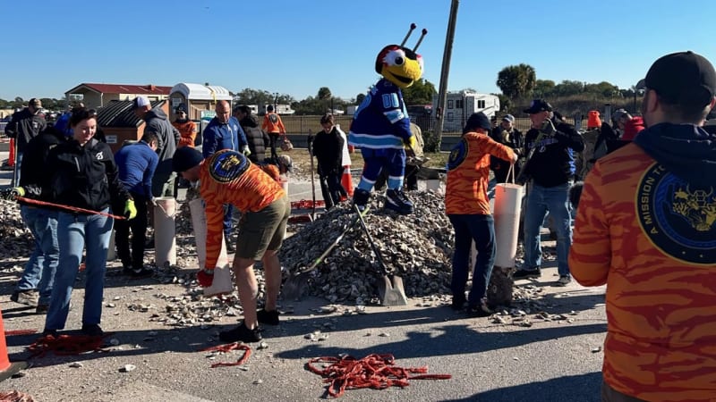 NHL and Veterans Move 6 Tons of Oyster Shells in Tampa