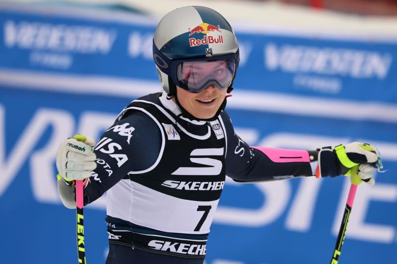 Lindsey Vonn celebrates at finish line in Tarvisio Italy super-G race wearing ski gear