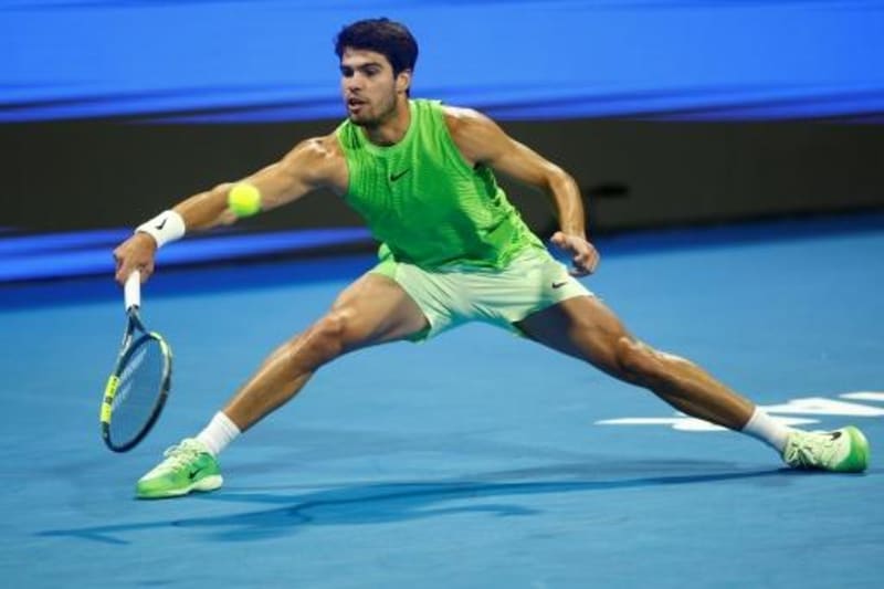 Carlos Alcaraz celebrates on tennis court after reaching Qatar Open final match