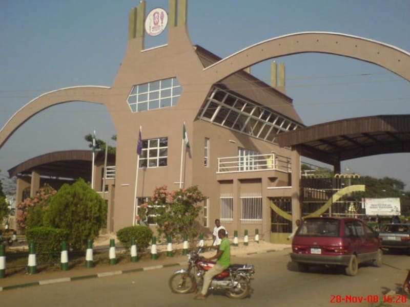 University of Benin campus building with students walking, representing Nigeria's educational innovation