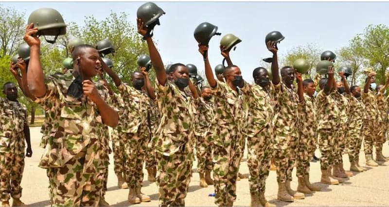 Nigerian Army officers in uniform standing proudly, representing diverse specialized corps and professional excellence in military service