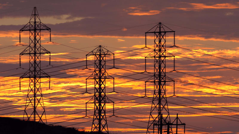 Nigerian power transmission lines and electrical infrastructure against blue sky symbolizing energy sector renewal