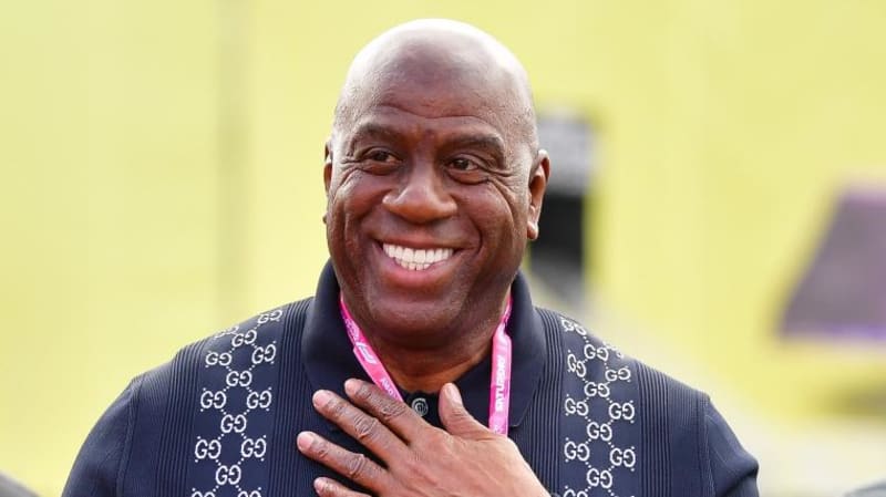 Magic Johnson Breaks Tradition at Rain-Soaked Rose Bowl Coin Toss