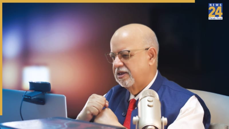 Indian entrepreneur Suresh Mansharamani celebrating business success milestone in modern office setting