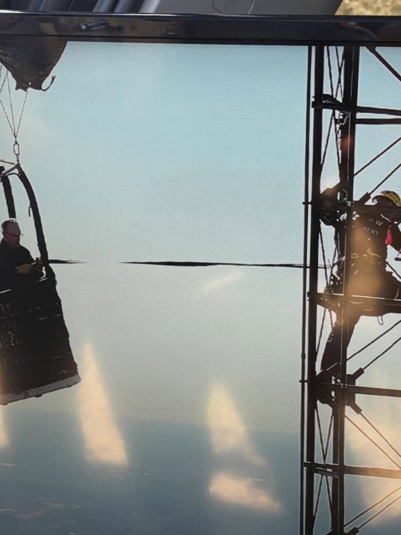 Texas Firefighters Save 2 From Balloon Stuck on Tower - Image 5
