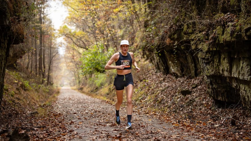 Courtney Olsen running on historic railway grade during her 50-mile world record attempt